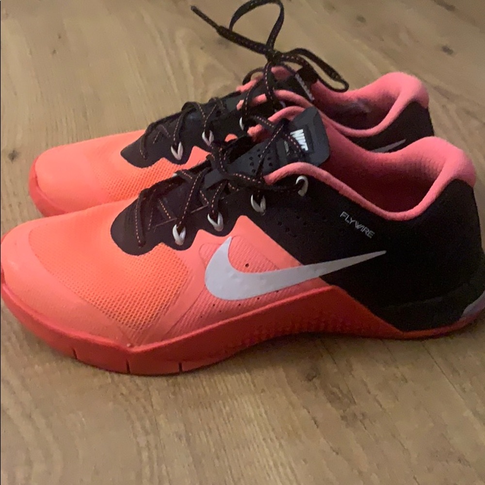 Nike orange and black flywire metcons